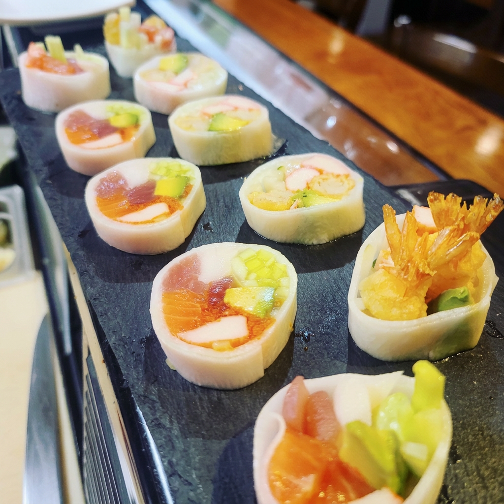 Colorful seafood rolls with avocado and crispy tempura
